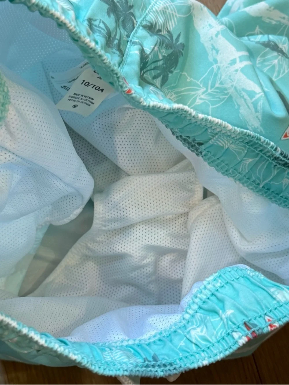 Oshkosh boys tropical aqua blue swim trunks 10